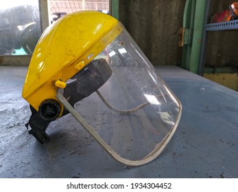 Yellow Face shield for grinding - Powered by Shutterstock