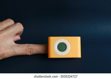 Yellow Fingertip Clip Blood Oxygen Meter.