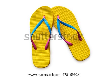 Yellow flip flops isolated on white background. Top view