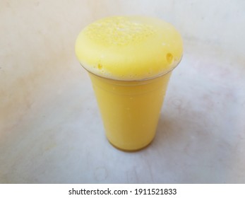 Yellow Foam Science Experiment Overflowing Cup In Plastic Container