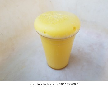 Yellow Foam Science Experiment Overflowing Cup In Plastic Container