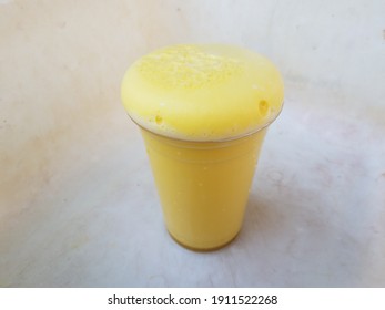 Yellow Foam Science Experiment Overflowing Cup In Plastic Container