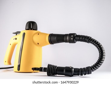 A Yellow Fog Machine Used For Concerts