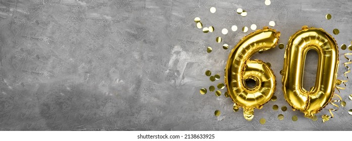Yellow foil balloon number, number sixty on a concrete background. Greeting card with the inscription 60. Anniversary concept. for anniversary, birthday, new year celebration. banner, copy space. - Shutterstock ID 2138633925