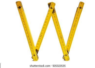 yellow folding ruler with white background
