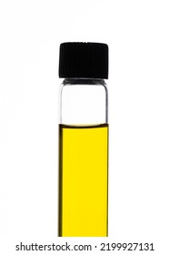 Yellow Food Coloring Added To Water In Glass Test Tube With Screw Cap