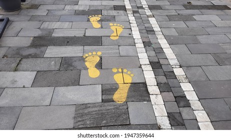 Yellow Footprint Marks White Lines On Stock Photo 1947359644 | Shutterstock