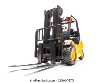 Yellow forklift truck shot on white background - Shutterstock ID 325664873