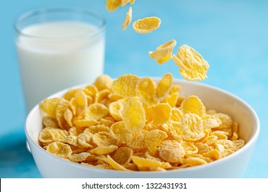 Yellow Frosted Corn Flakes Bowl And A Glass Of Milk For Dry, Cereals Breakfast 