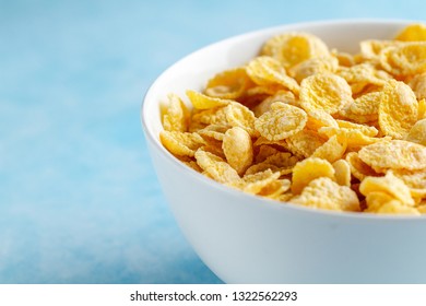 Yellow Frosted Corn Flakes Bowl For Dry, Cereals Breakfast. Copy Space 