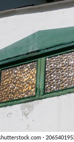 Yellow Frosted Glass Window In Rural Road