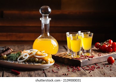 Yellow Fruit Liqueur With Russian Herring Appetizer