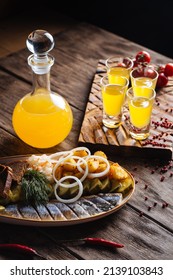 Yellow Fruit Liqueur With Russian Herring Appetizer