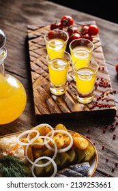 Yellow Fruit Liqueur With Russian Herring Appetizer