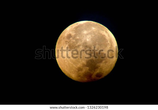 Yellow full moon,\
different perspective