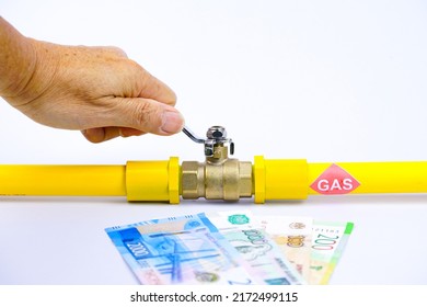 Yellow Gas Pipe White Man’s Hand Holding Control Valve,Gas Supply Only Rubles Concept.