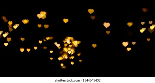 Yellow Glowing Stars In Black Background
