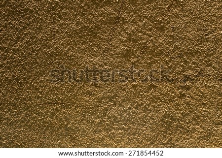 Yellow Golden sand wall background for design.