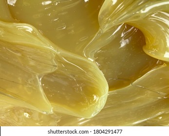 Yellow Grease Is Used In Factory Machines For System Lubrication.