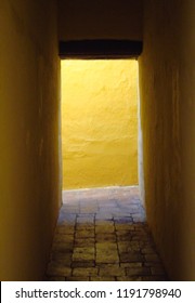                 Yellow Hallway In Spanish Colonial Home In Barichara, Colombia          