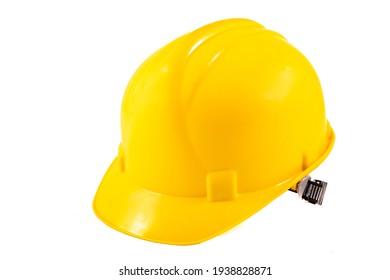 Yellow hard hat for construction workers. Protective clothing and accessories for employees. Light background. - Shutterstock ID 1938828871