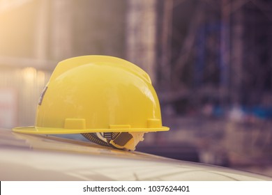 Yellow Hard Hat On Construction Site