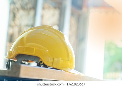 Yellow  hard safety helmet hat for safety workman as engineer or worker. - Shutterstock ID 1761823667
