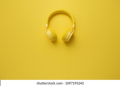 Yellow Headphones On Yellow Background. Music Concept.