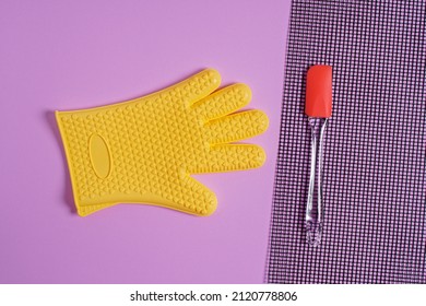 Yellow Heat Resistant Glove With Kitchen Utensil Flat Lay