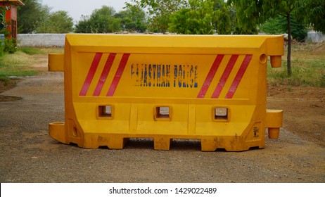 yellow heavy duty plastic barrier, equipment barricading on roadside - Shutterstock ID 1429022489