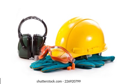 Yellow helmet, gloves and goggles with headphones on white background