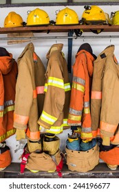 Yellow Helmet And Jacket Of Fire Fighter.