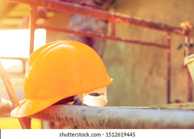 Yellow helmet on steel structure at construction site, safety at work concept - Shutterstock ID 1512619445