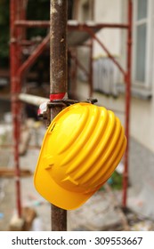 Yellow Helmet On Work Place 