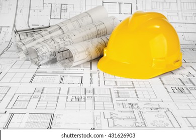 Yellow helmet and project drawings - Shutterstock ID 431626903