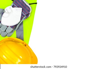 Yellow Hi Vis Vest And Hard Hat With Safety Gloves And A Dust Mask Isolated On A Pure White Background