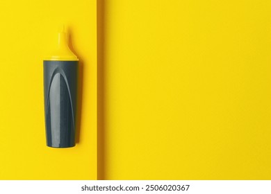 Yellow Highlighter on Solid Yellow Background - Minimalist Office Supply Photo - Powered by Shutterstock