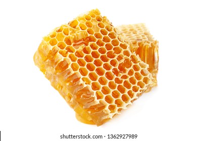 Yellow Honeycomb slice closeup isolated on white background