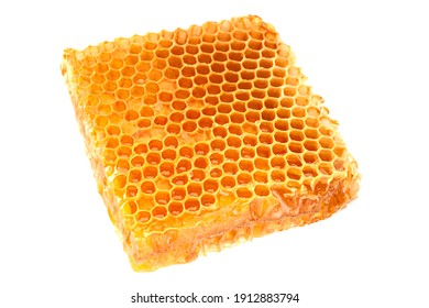 Yellow Honeycomb slice closeup isolated on white background