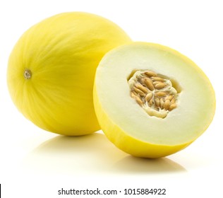 Yellow honeydew melon and one half with seeds isolated on white background