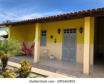 Yellow House Front Yard And Garage