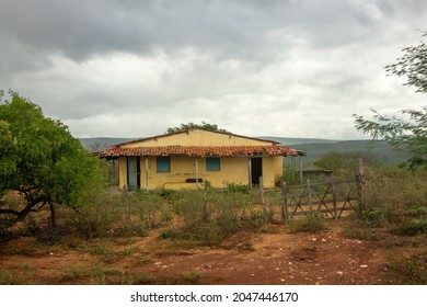 Yellow Humble House Abandoned Close To A Road