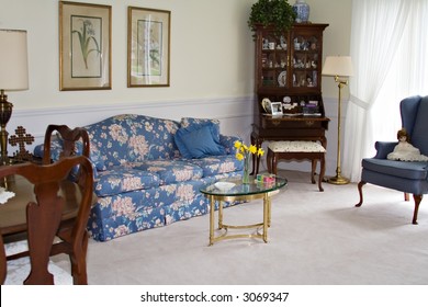 A Yellow Interior Room Of A Home - Queen Anne Furnishings.