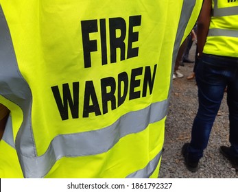Yellow jacket showing fire warden on duty. Safety background.