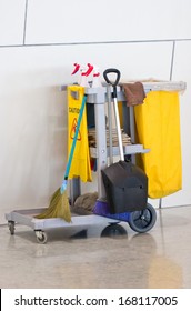 Yellow Janitor Cart.