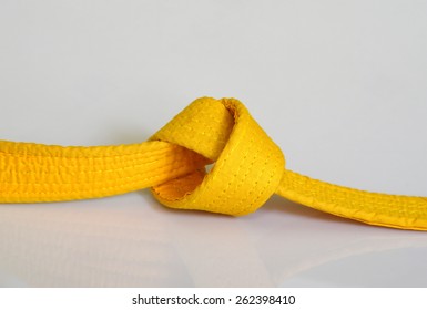 Yellow Karate Belt Knotted.