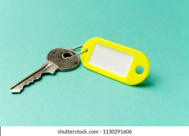 Yellow key tag turquoise