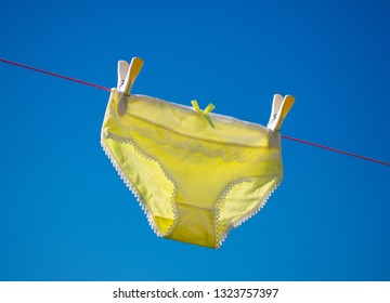 Yellow Knickers Drying On The Washing Line.