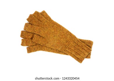 Yellow knitted gloves with open fingers isolated on white background. Handwork. View from above.