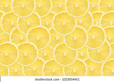 Yellow lemon slices pattern texture background.